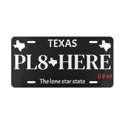 Black PL8 HERE vanity license plate for car enthusiasts  
Custom novelty tag for automotive fans  
Decorative aluminum license plate – black finish
