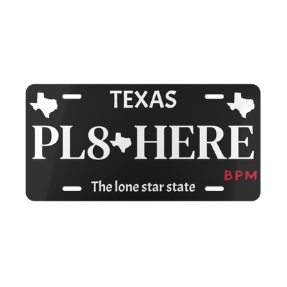 Black PL8 HERE vanity license plate for car enthusiasts  
Custom novelty tag for automotive fans  
Decorative aluminum license plate – black finish
